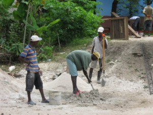 Mixing concrete Haiti style