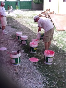 Daniel boxing up the pepto paint for the final coat.